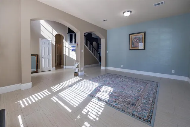a view of a hallway with a couch