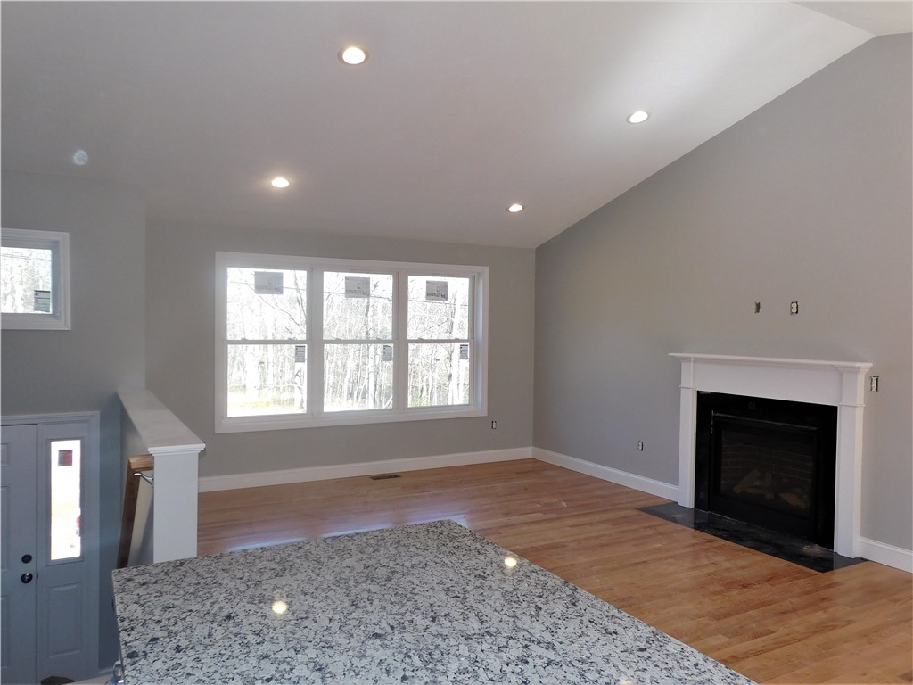 696 Main Street Hopkinton, RI 02832 - Photo 4 of 18 living room - gas FP