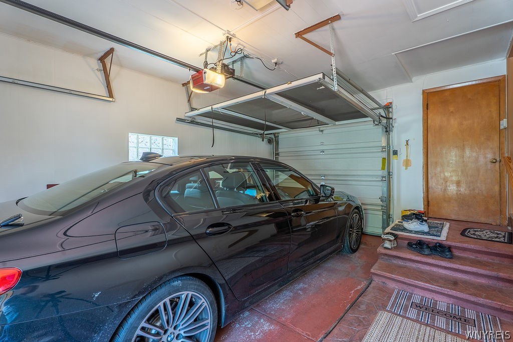 638 Borden Road Cheektowaga, NY 14227 - Photo 40 of 41 Deep 1 1/2 car garage with front and rear garage d