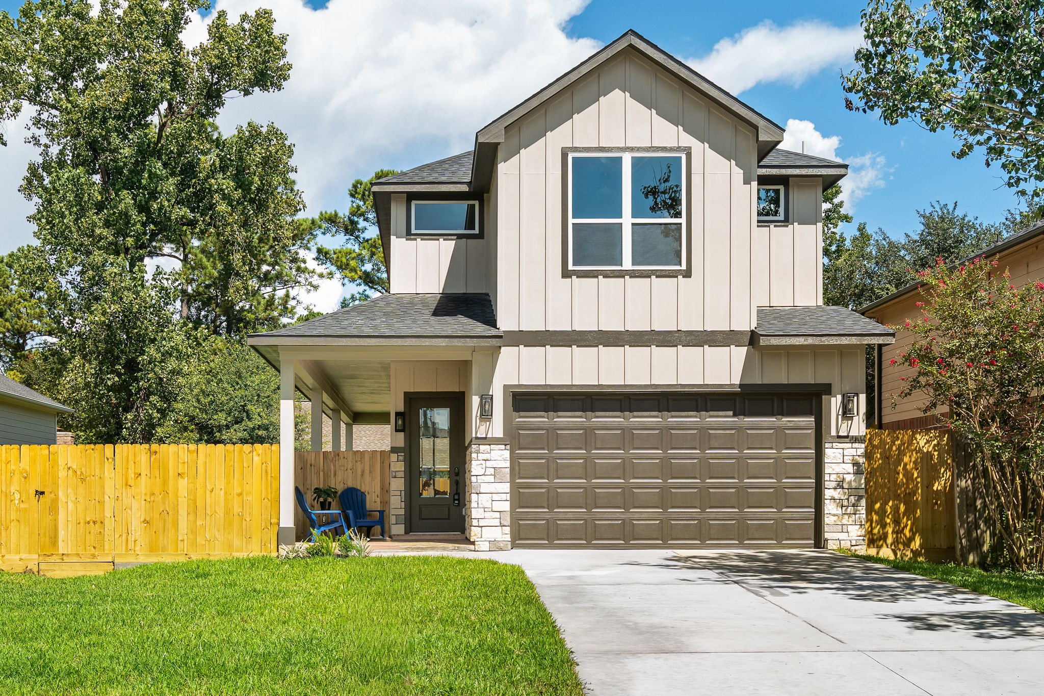 22806 August Leaf Drive Tomball, TX 77375 - Photo 1 of 34 a front view of a house with a yard