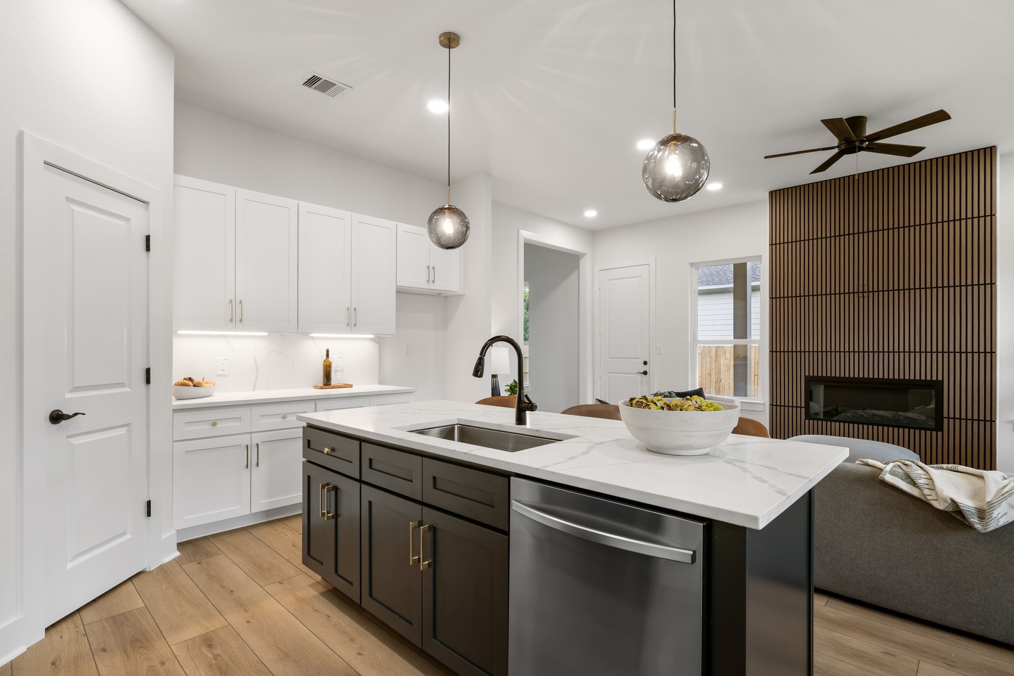 22806 August Leaf Drive Tomball, TX 77375 - Photo 11 of 34 a kitchen with a sink cabinets and window