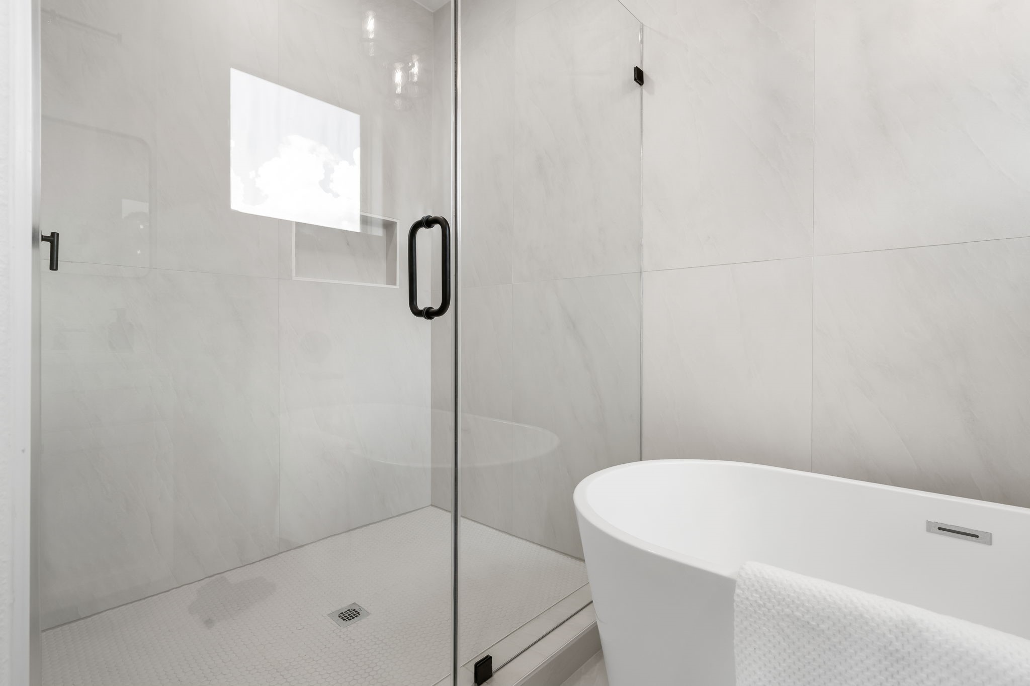 22806 August Leaf Drive Tomball, TX 77375 - Photo 21 of 34 a bathroom with a shower and a shower