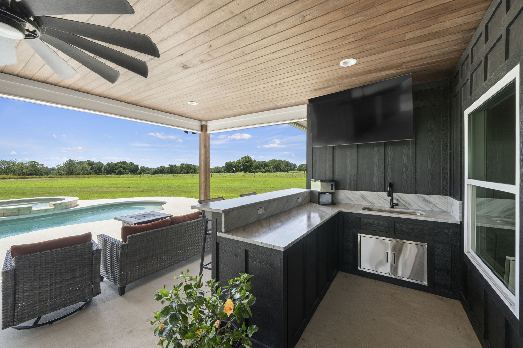 1655 Old Cuero Road Yoakum, TX 77995 - Photo 16 of 24 Expansive views of the surrounding countryside provide a peaceful backdrop, seamlessly blending luxury outdoor living with the beauty of nature.