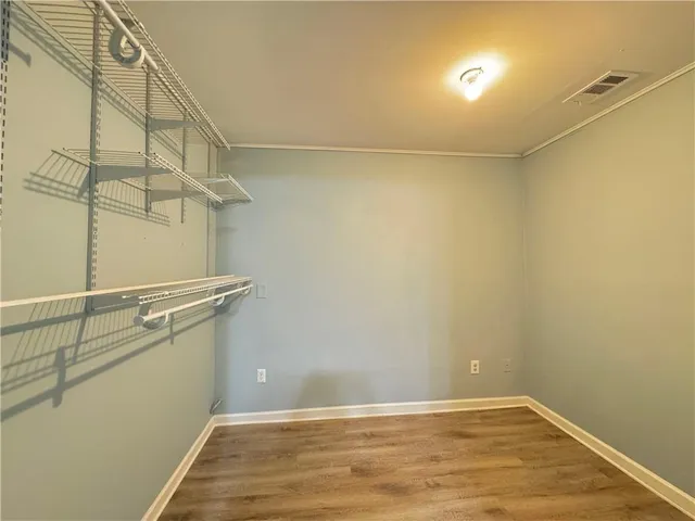 a view of a room with racks on the wall