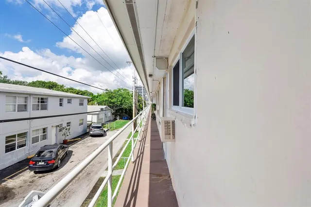 a bird view of a building and yard