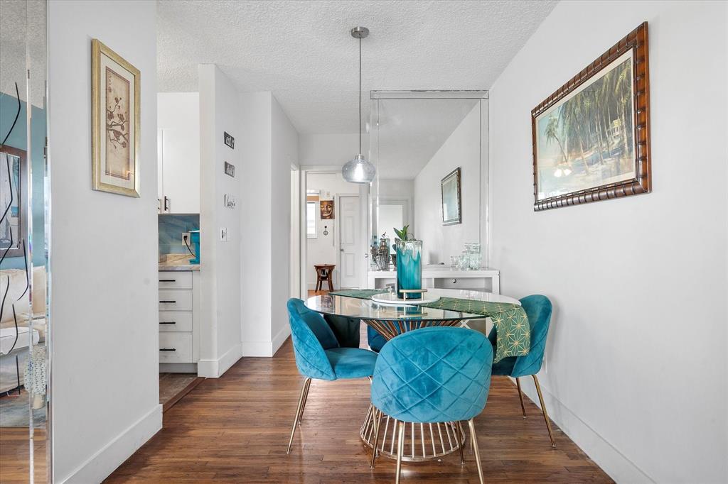 900 Atlantic Shores Boulevard, Unit 209 Hallandale Beach, FL 33009 - Photo 5 of 20 a view of a dining room with furniture