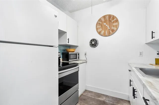 a bedroom with a bed and a table in it