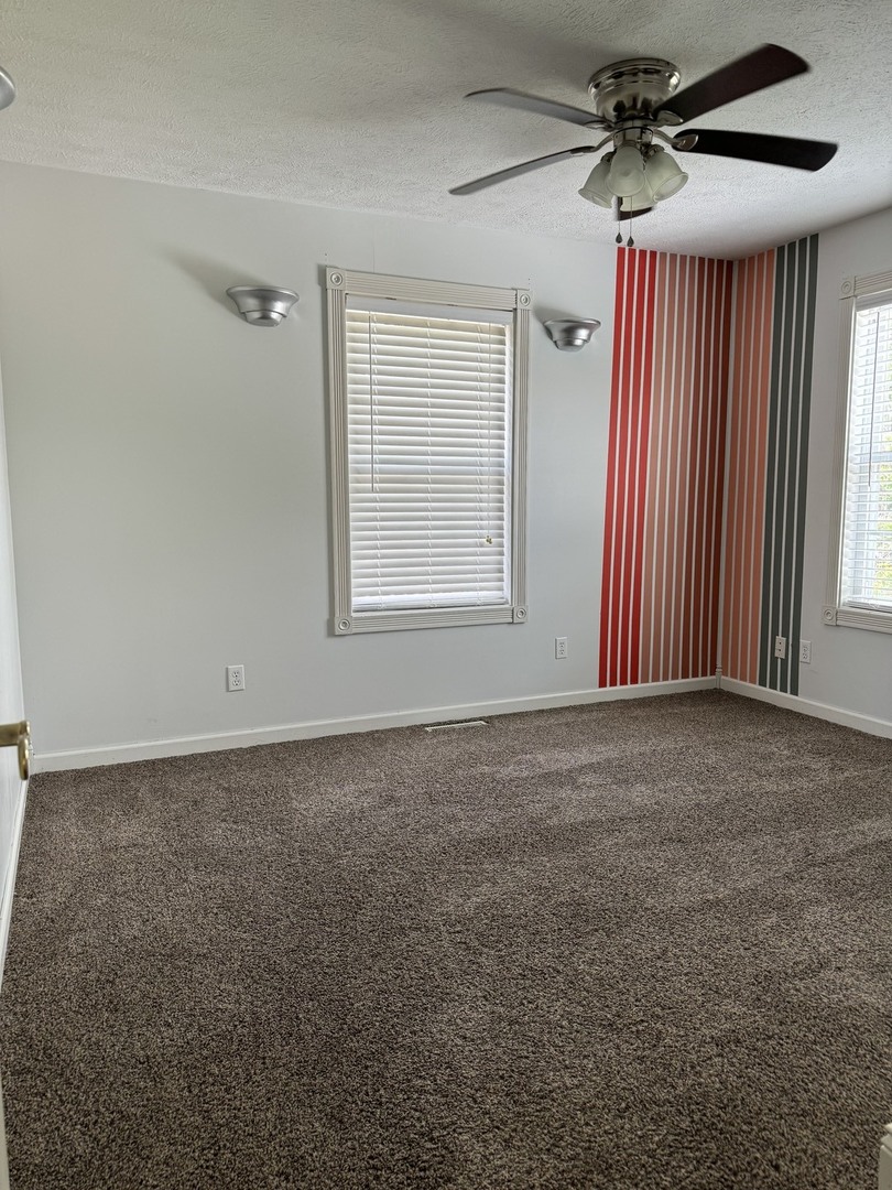 561 County Road 2000 East Secor, IL 61771 - Photo 17 of 37 an empty room with windows