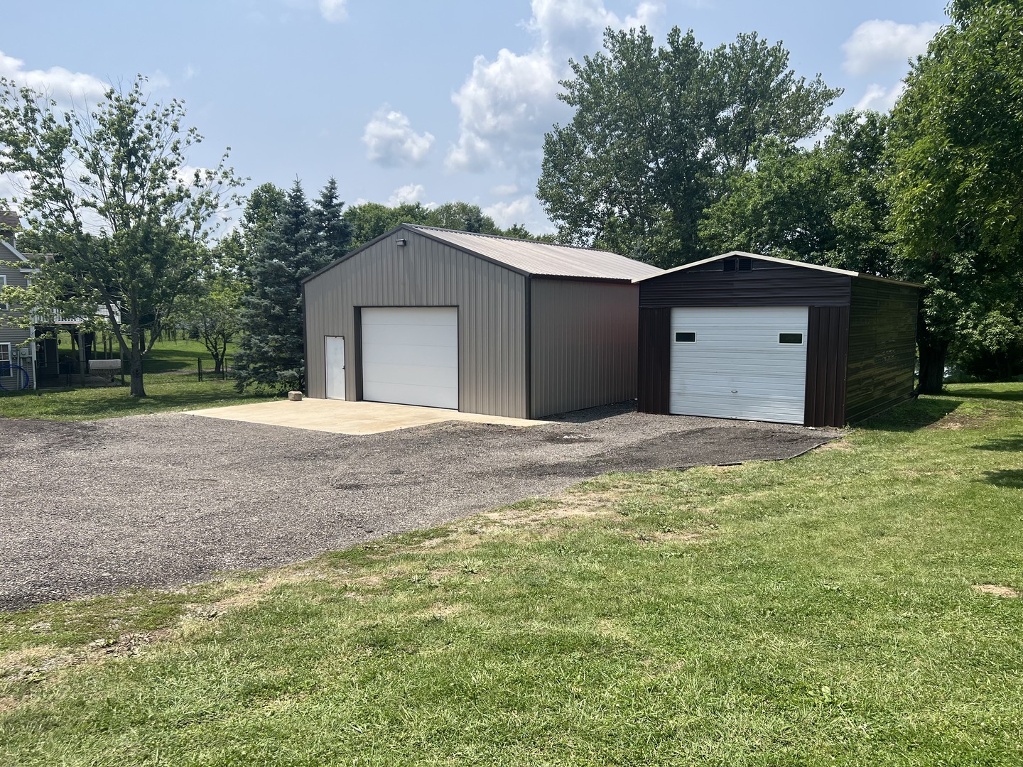 561 County Road 2000 East Secor, IL 61771 - Photo 36 of 37 a big house with a big yard and large trees