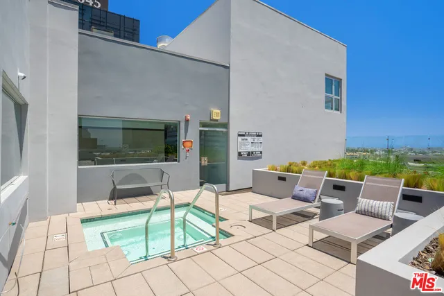 a building outdoor space with patio furniture