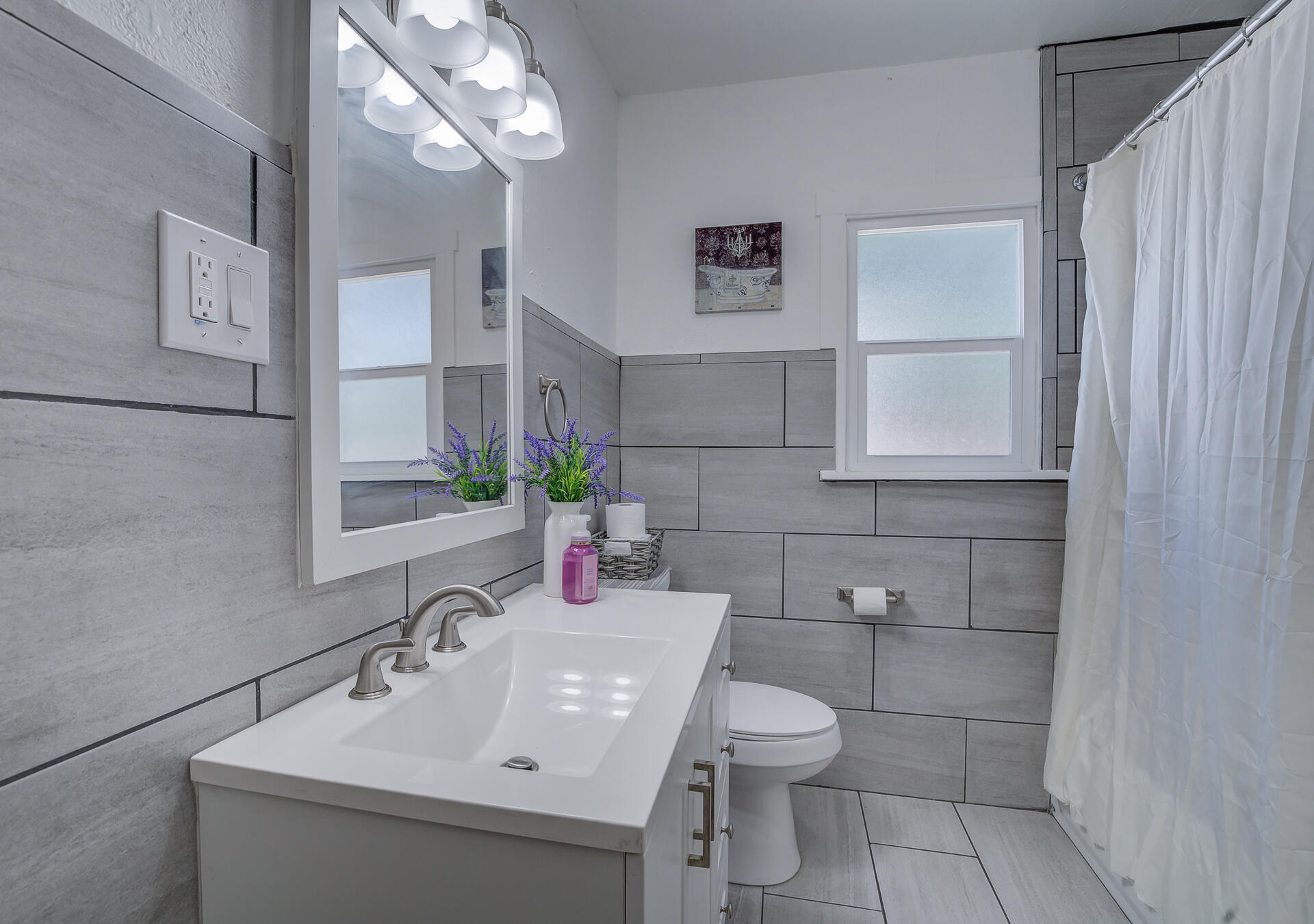2962 Lanning Avenue Redding, CA 96001 - Photo 14 of 38 a bathroom with a sink toilet and mirror