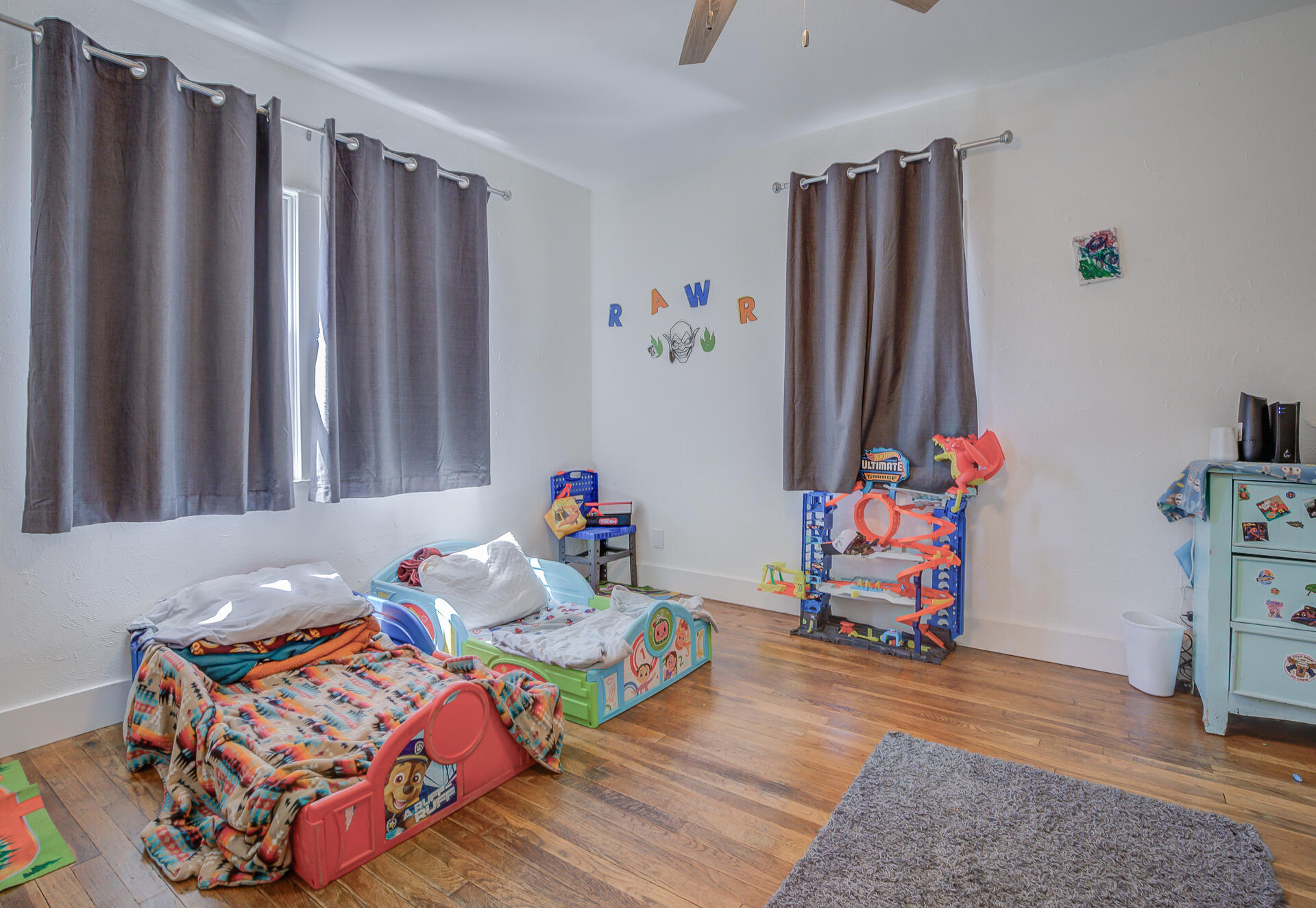 2962 Lanning Avenue Redding, CA 96001 - Photo 16 of 38 a bedroom with furniture and a book shelf