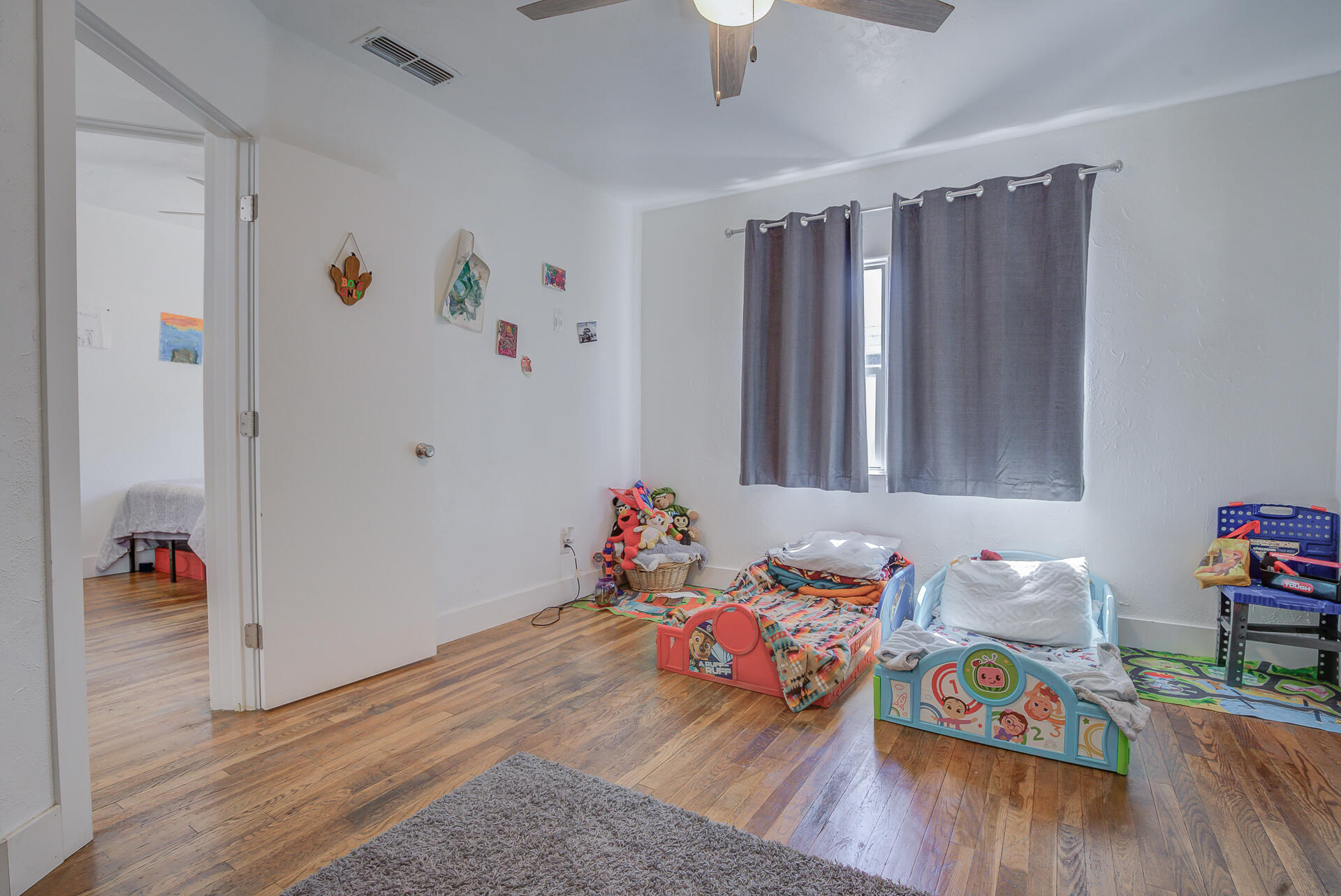 2962 Lanning Avenue Redding, CA 96001 - Photo 17 of 38 a playing room with toys and wooden floor