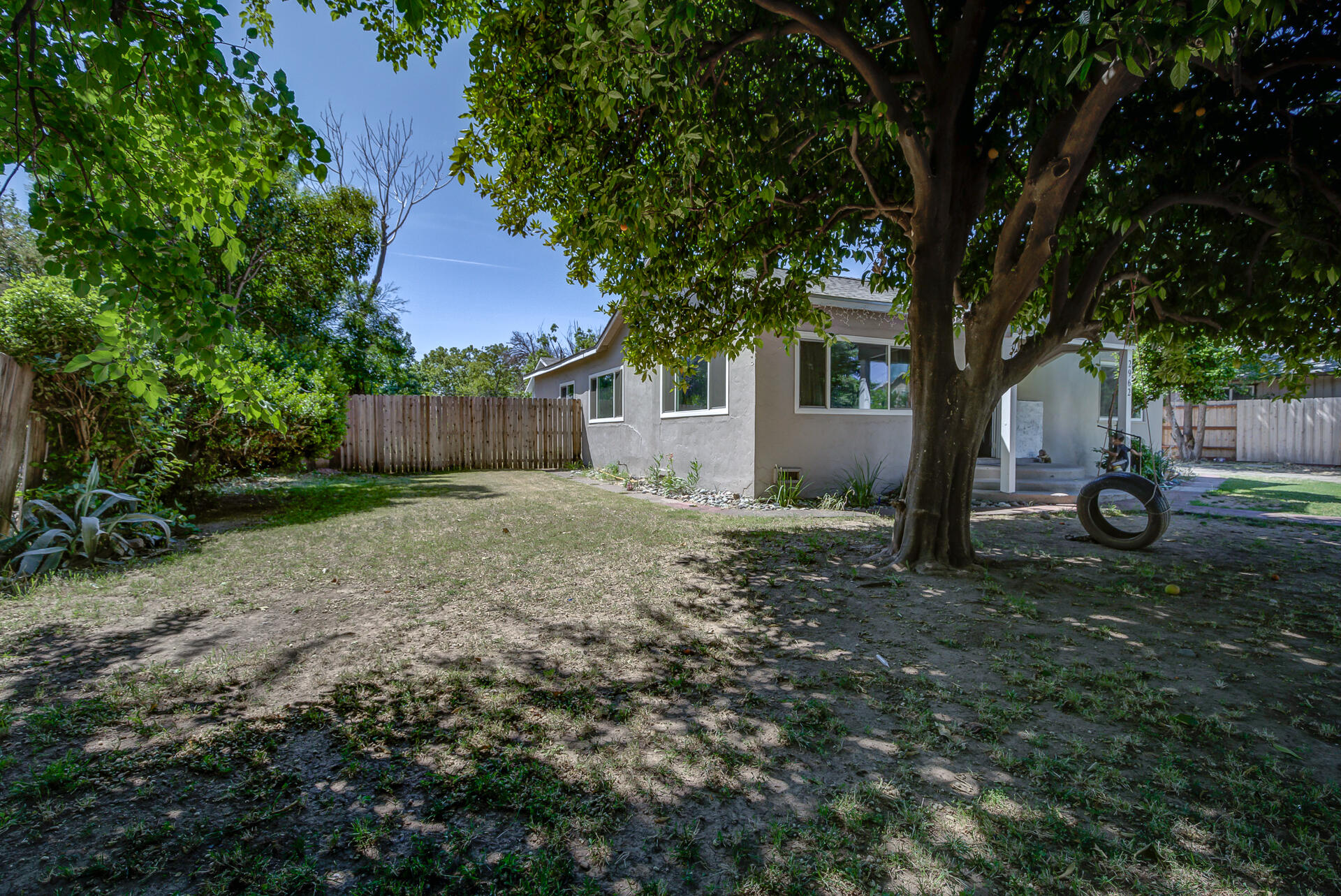 2962 Lanning Avenue Redding, CA 96001 - Photo 20 of 38 a backyard of a house with lots of green space