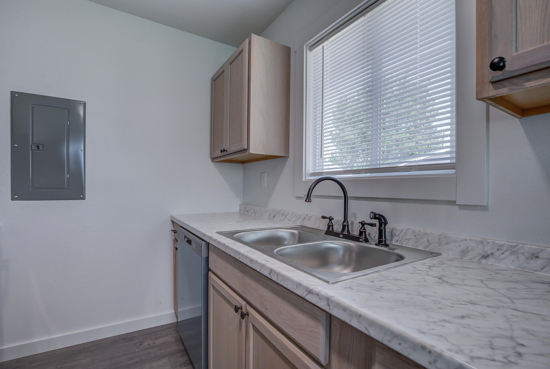 2962 Lanning Avenue Redding, CA 96001 - Photo 28 of 38 a kitchen with a sink and cabinets