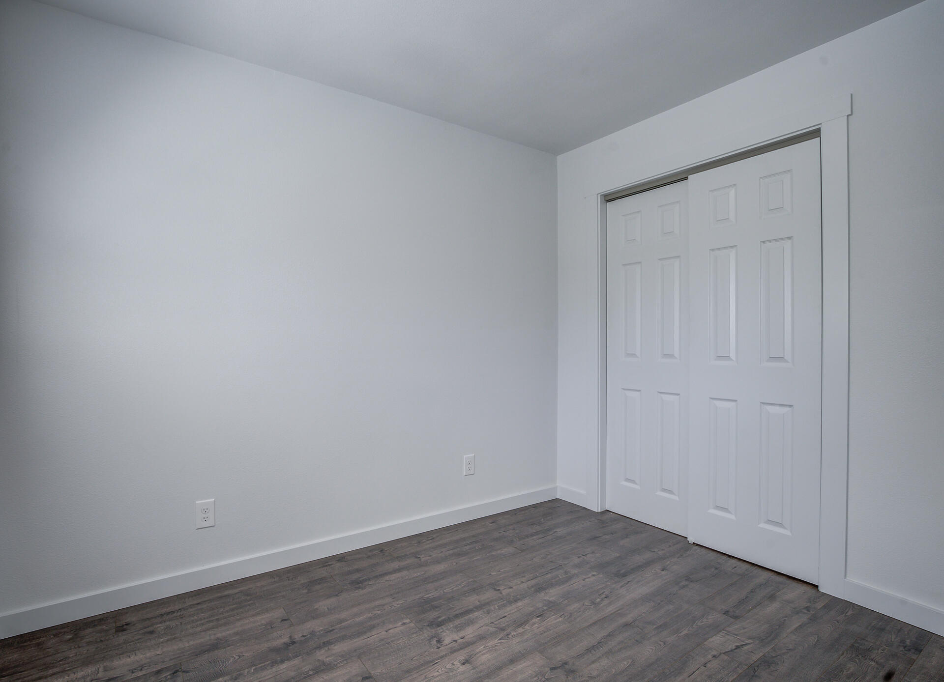 2962 Lanning Avenue Redding, CA 96001 - Photo 32 of 38 a view of an empty room with wooden floor