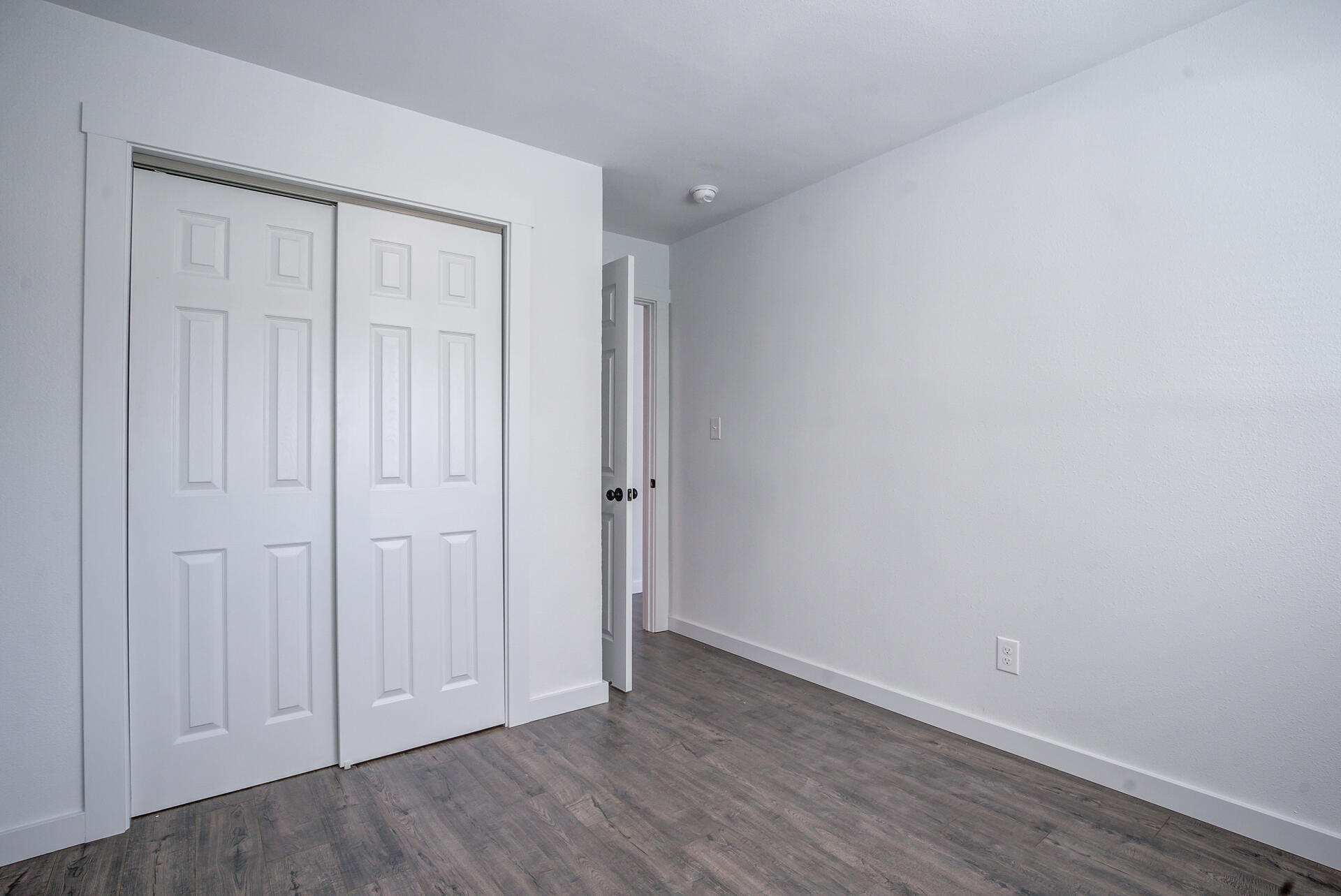 2962 Lanning Avenue Redding, CA 96001 - Photo 33 of 38 a view of an empty room with wooden floor
