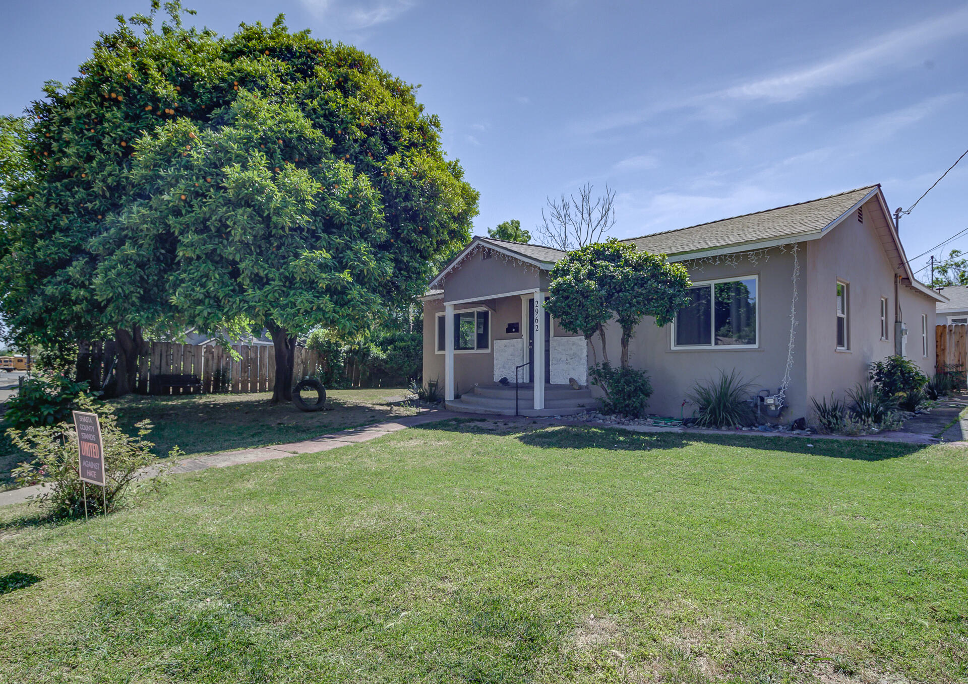 2962 Lanning Avenue Redding, CA 96001 - Photo 4 of 38 a front view of house with yard and outdoor seating