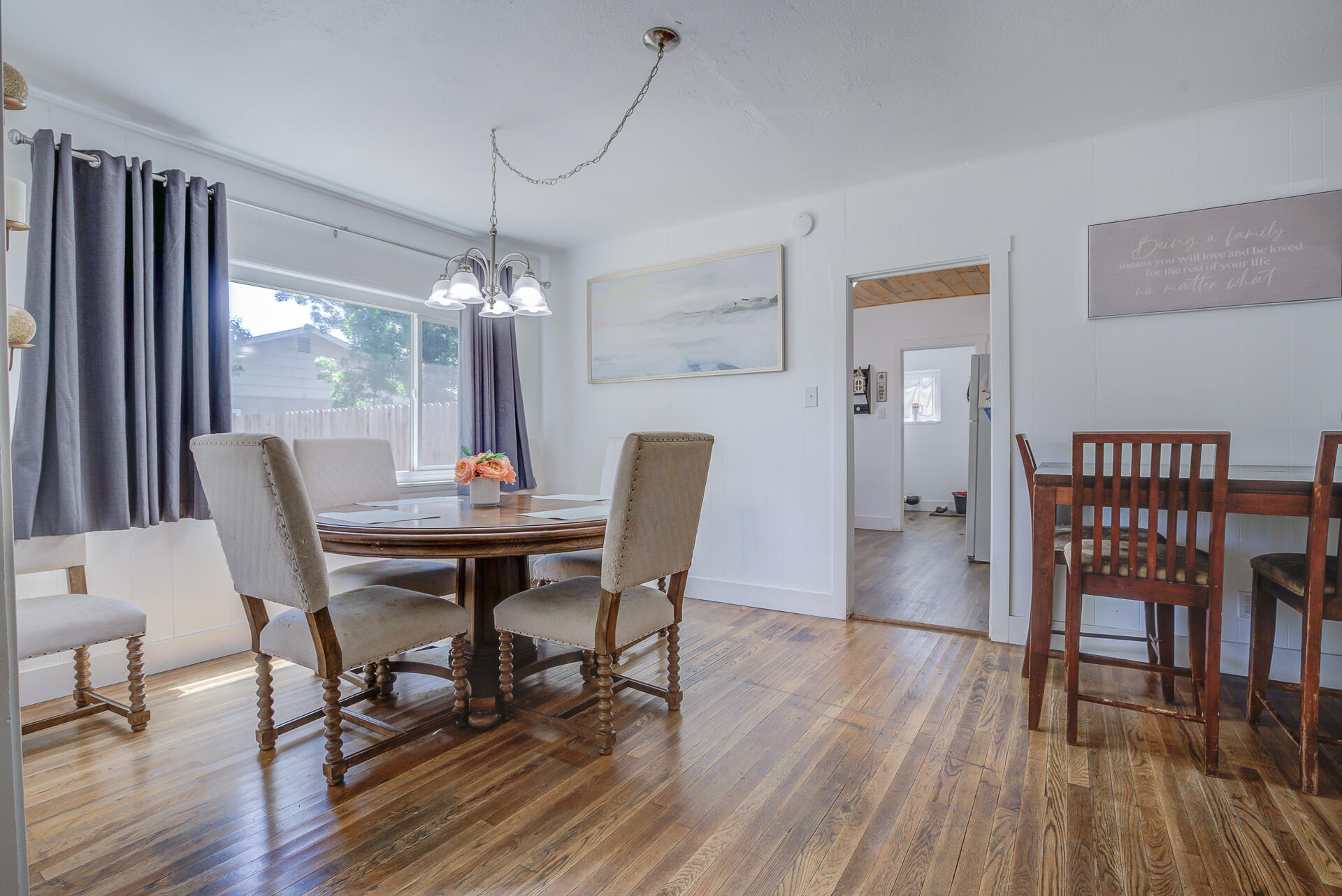 2962 Lanning Avenue Redding, CA 96001 - Photo 7 of 38 a dining room with furniture window wooden floor