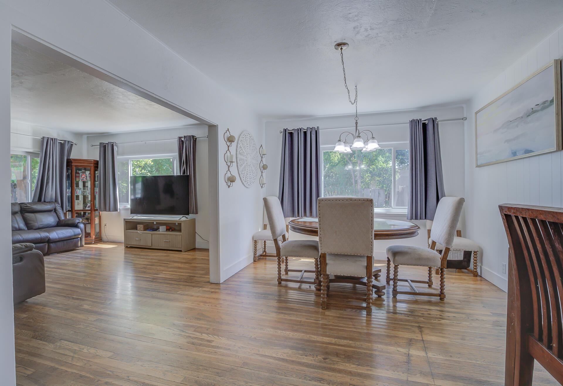2962 Lanning Avenue Redding, CA 96001 - Photo 8 of 38 a view of a dining room with furniture window and wooden floor