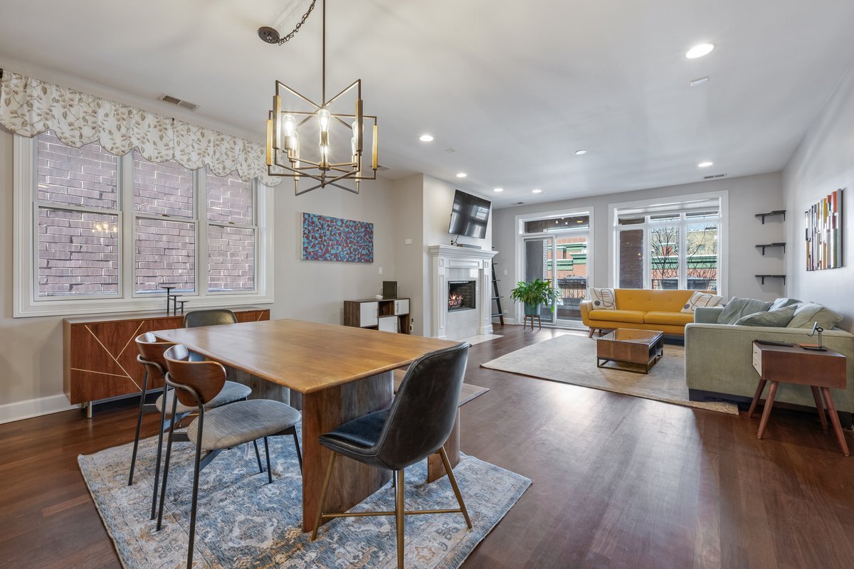 1025 West Monroe Street, Unit 3W Chicago, IL 60607 - Photo 9 of 19 a living room with furniture a dining table and chairs