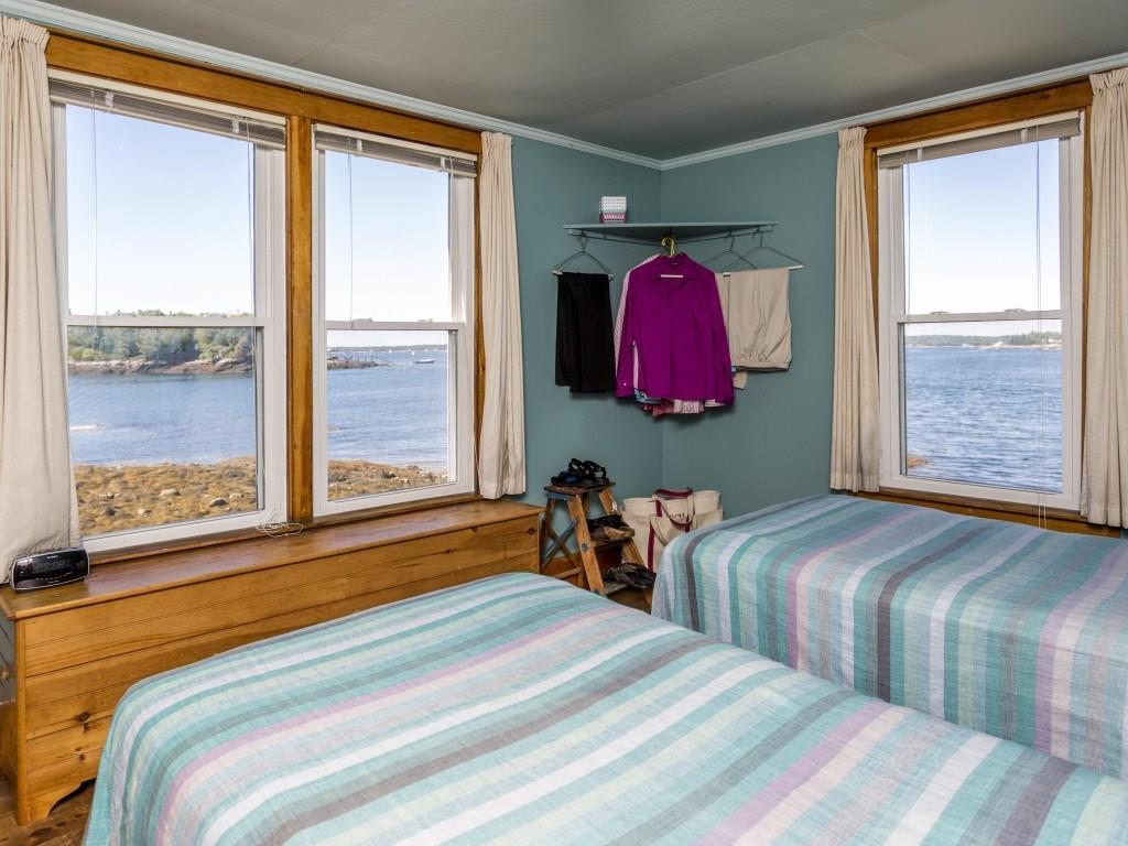 153-260 Van Horn Road East Boothbay, ME 04544 - Photo 7 of 25 The wharf house bedroom with pine floor