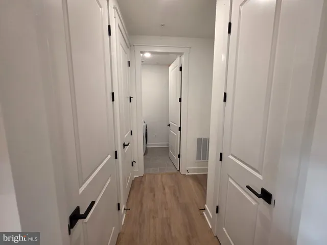 a view of a bathroom with tub