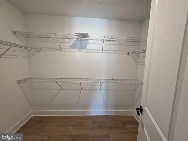 a view of a room with racks on the wall