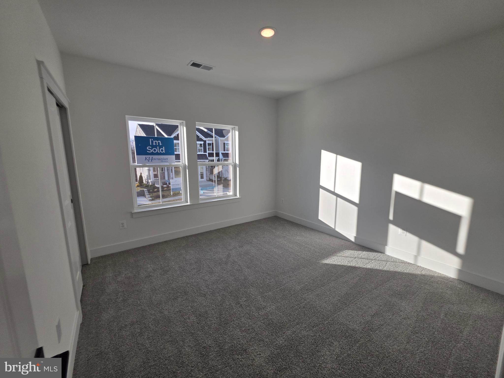 4817 Grandiflora Circle Perry Hall, MD 21128 - Photo 30 of 35 a view of an empty room with a window