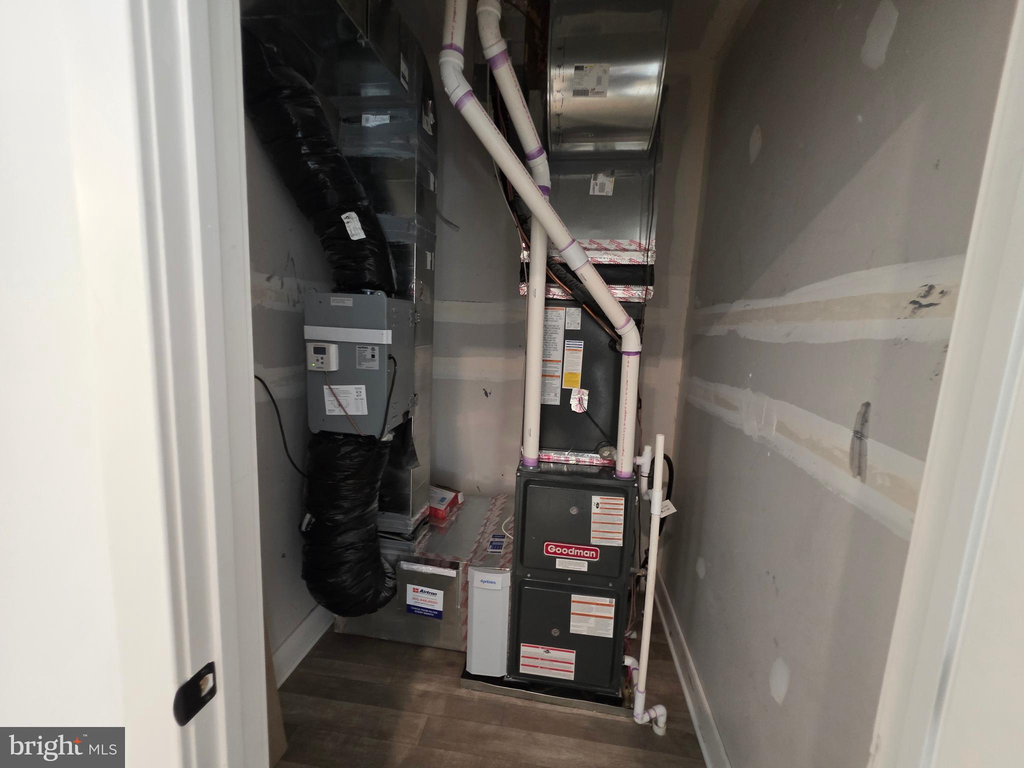 4817 Grandiflora Circle Perry Hall, MD 21128 - Photo 35 of 35 a view of hallway with wooden floor and stairs