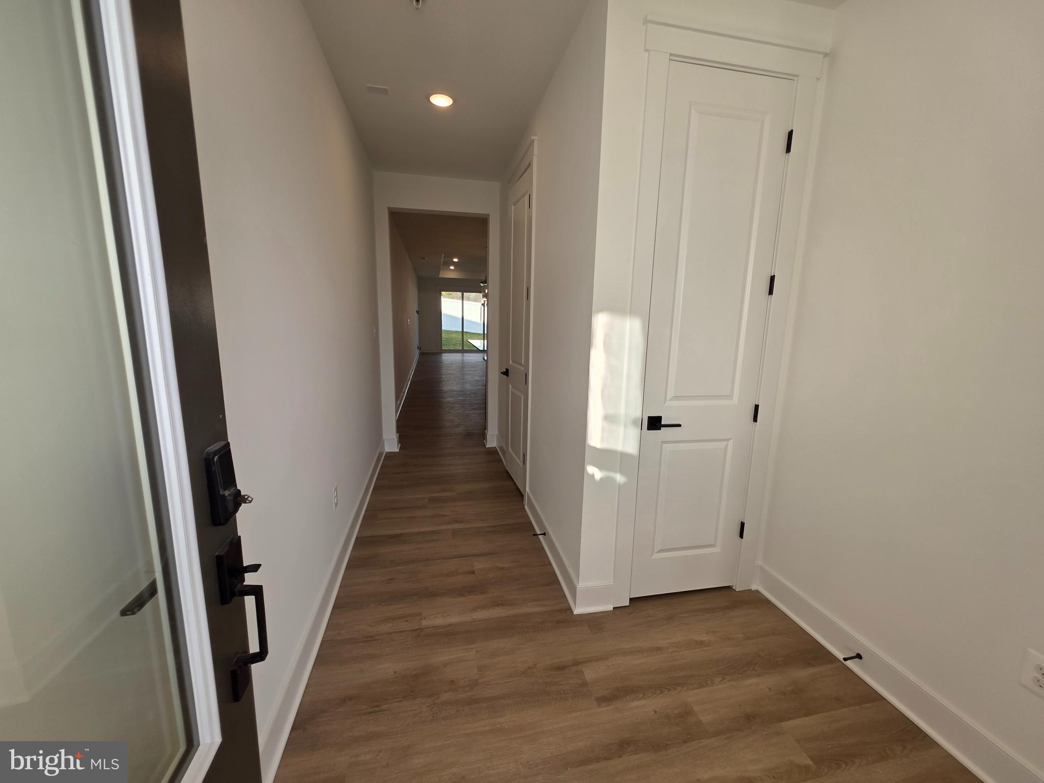 4817 Grandiflora Circle Perry Hall, MD 21128 - Photo 4 of 35 a view of a hallway with wooden floor