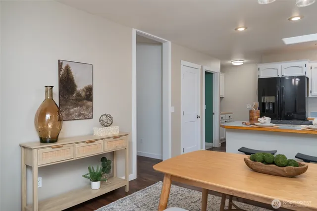 a living room with furniture and flat screen tv