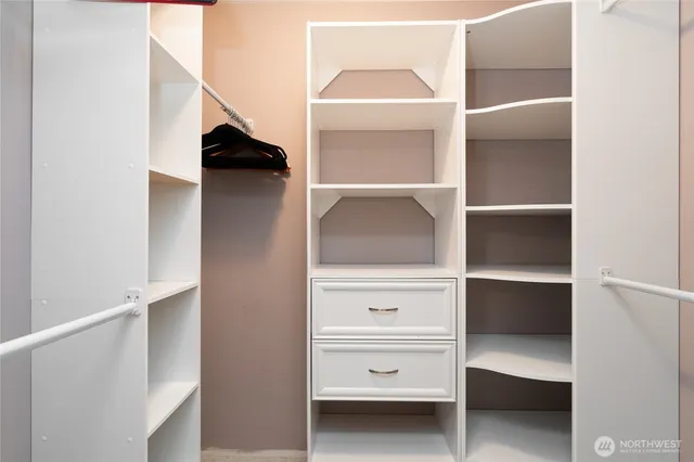 a view of an empty walk in closet
