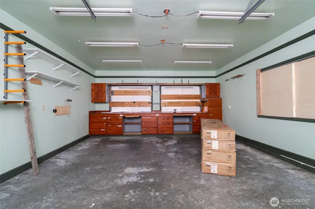 a view of livingroom with table and sofas