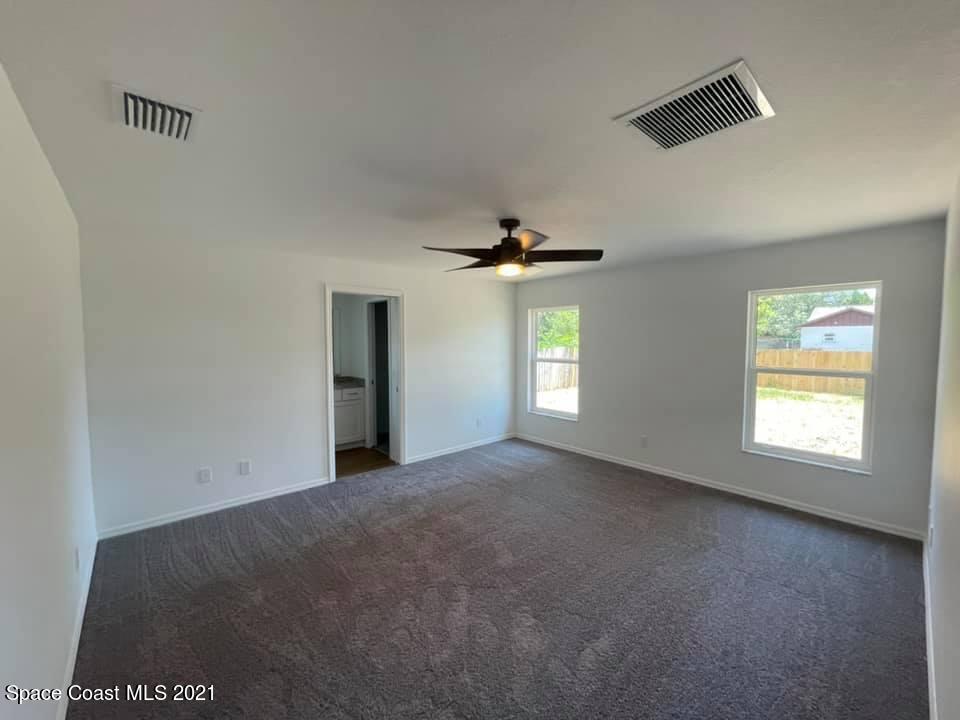 642 Alhambra Road Southeast Palm Bay, FL 32909 - Photo 13 of 24 Master Suite