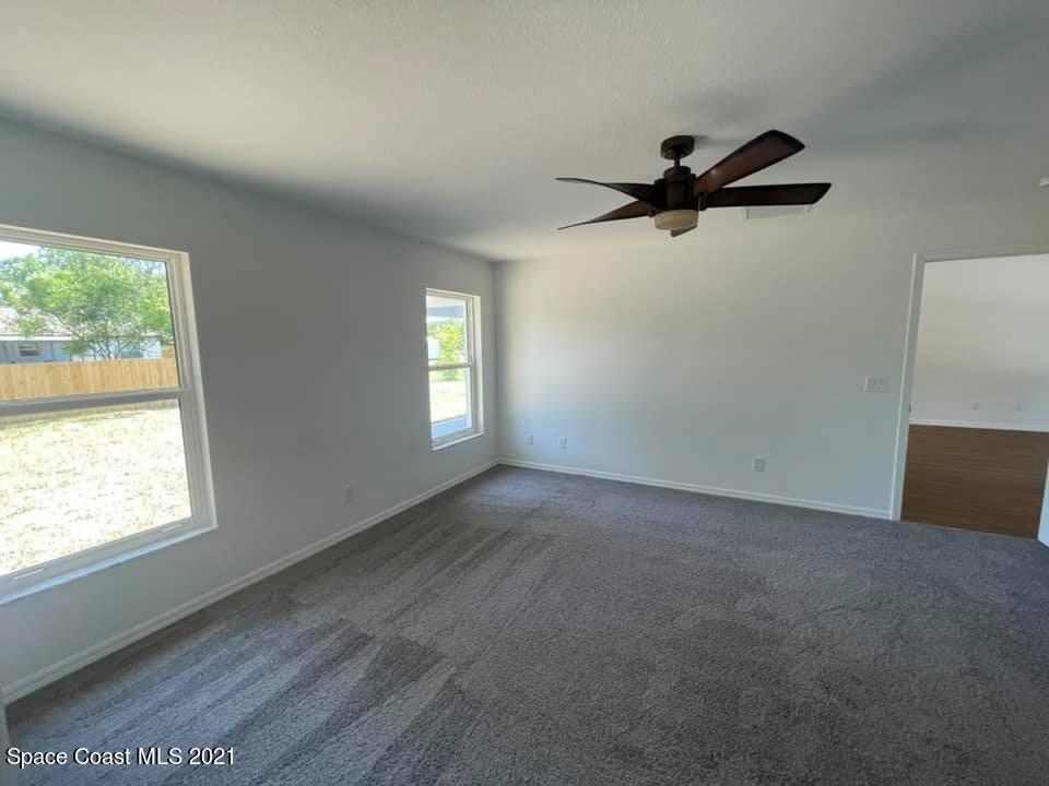 642 Alhambra Road Southeast Palm Bay, FL 32909 - Photo 14 of 24 Master suite