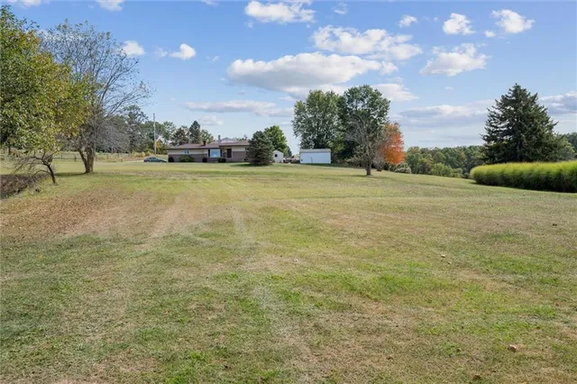 a view of balcony with wooden floor