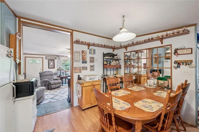 a kitchen with stainless steel appliances granite countertop a stove a sink and cabinets