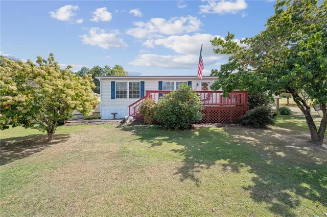 a view of a house with a garden