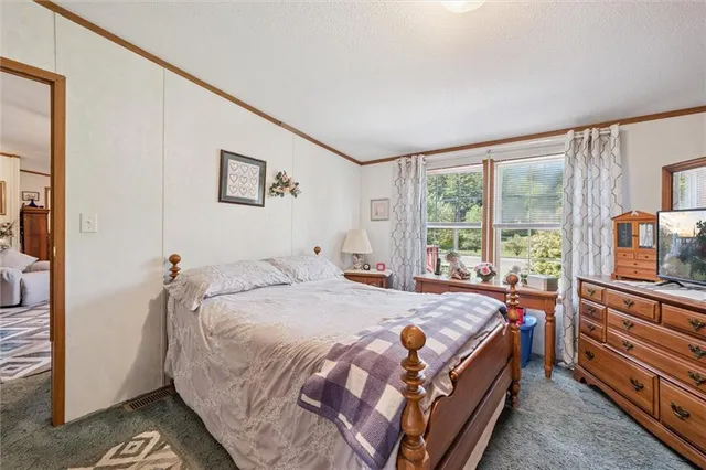 a bathroom with a sink double vanity and a mirror