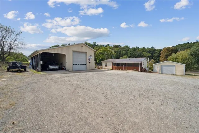 a view of a house with a garage