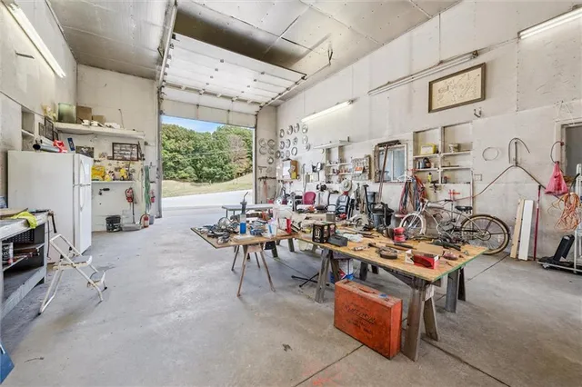 a white toilet sitting next to a bathroom sink and a window