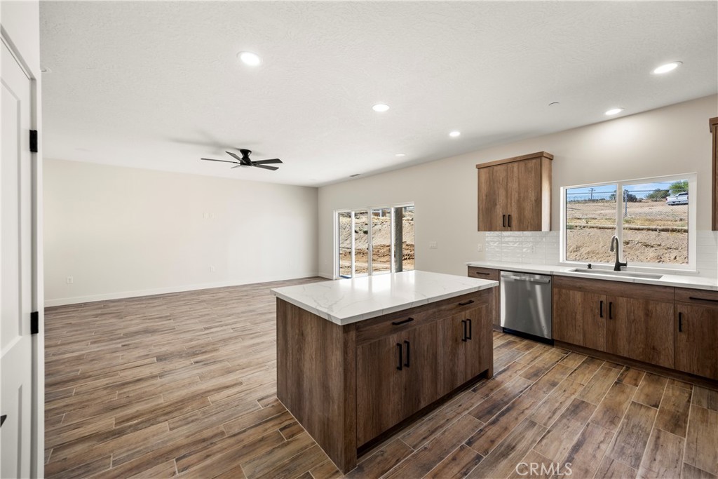 22324 Rancho Street Apple Valley, CA 92308 - Photo 22 of 47 a kitchen with a stove and a sink
