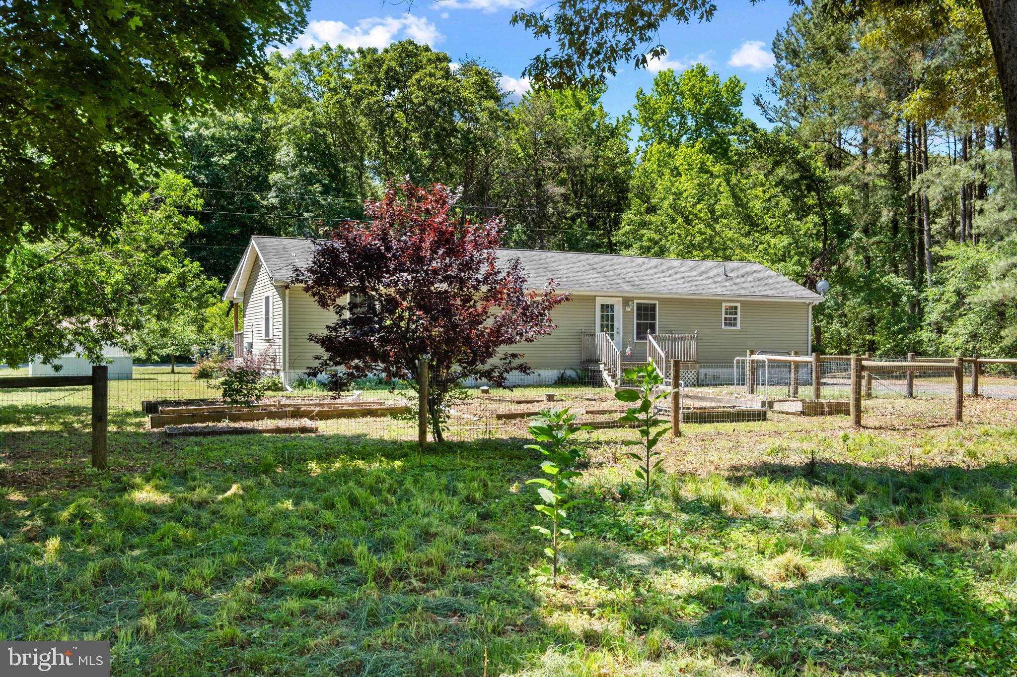 23116 Gilpin Point Road Preston, MD 21655 - Photo 41 of 66 Rear exterior with Garden beds.