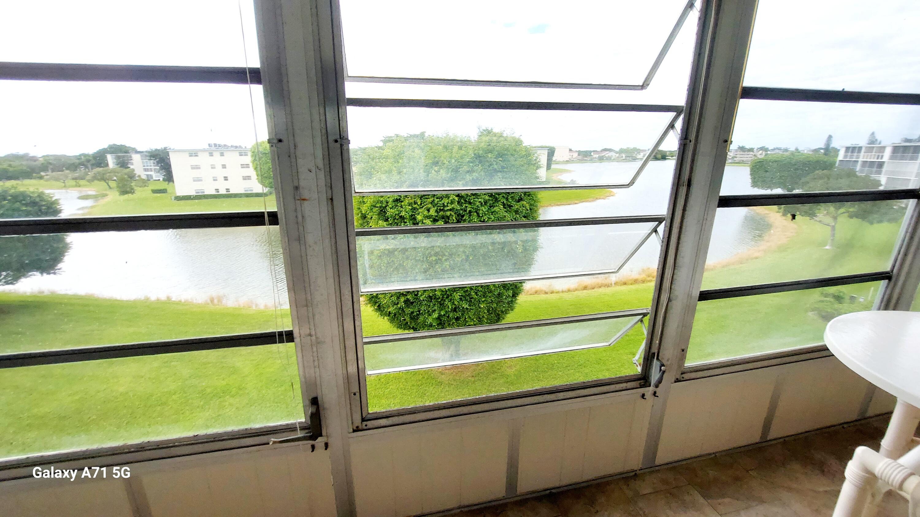 4079 Cornwall East, Unit 4079 Boca Raton, FL 33434 - Photo 15 of 41 a view of a room with an outdoor space