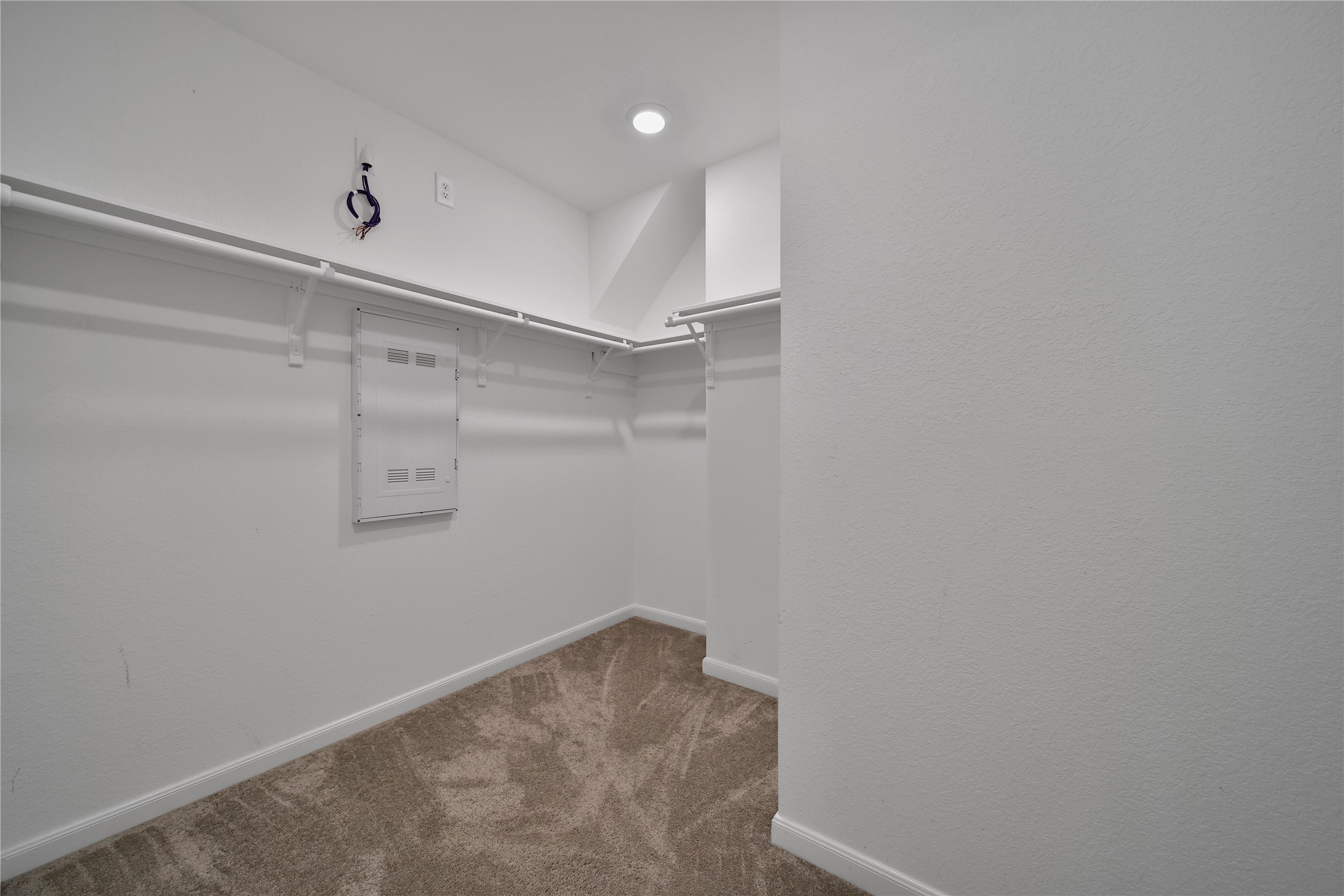 3306 Forest Chitto Dr Spring Spring, TX 77373 - Photo 22 of 35 a view of a room with racks on the wall