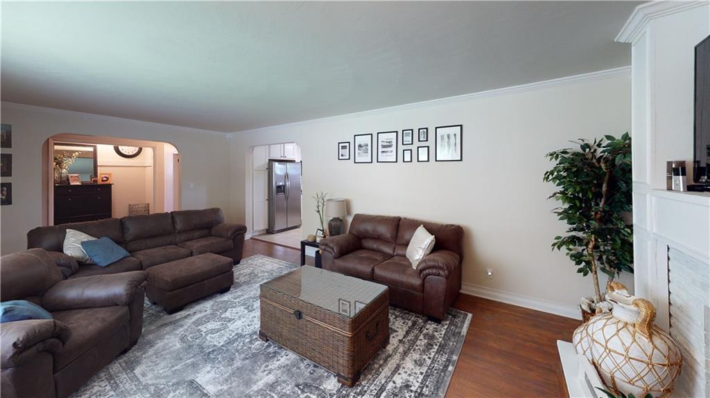 110 Weitzel Road Butler, PA 16002 - Photo 4 of 25 Living Room Featuring Decorative Fireplace and Hardwood Floors!
