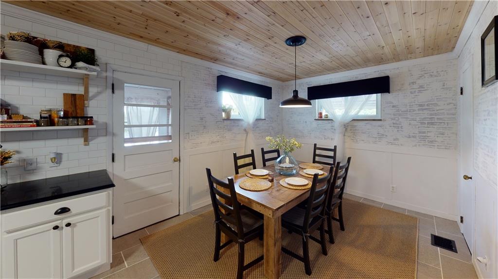 110 Weitzel Road Butler, PA 16002 - Photo 7 of 25 Remodeled Kitchen and Dining Room, Door opens to Enclosed Porch.