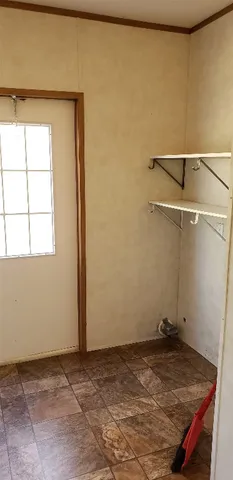 a view of a room with rack on the wall