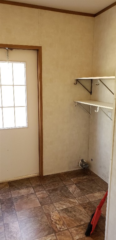 8315 Burleson Manor Road, Unit A Manor, TX 78653 - Photo 18 of 21 a view of a room with rack on the wall